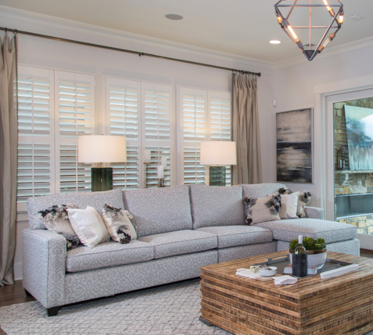 White polywood shutters in a large living room