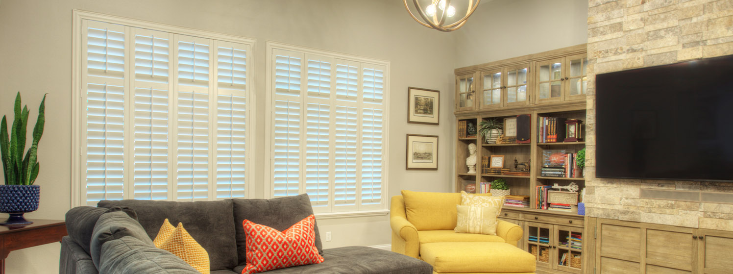 White polywood shutters in a large living room