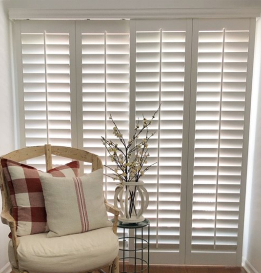 Glass sliding door with polywood shutters