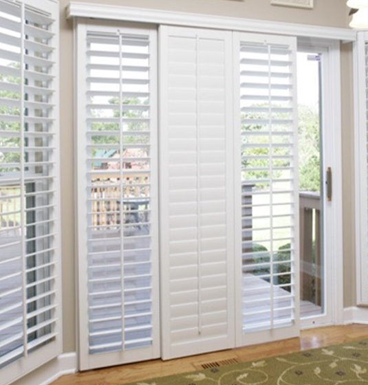 Glass sliding door with polywood shutters