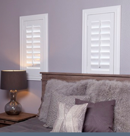 Studio shutters in a bedroom